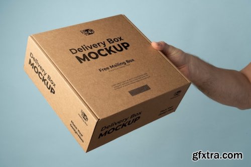 Hand holding delivery pack mockup