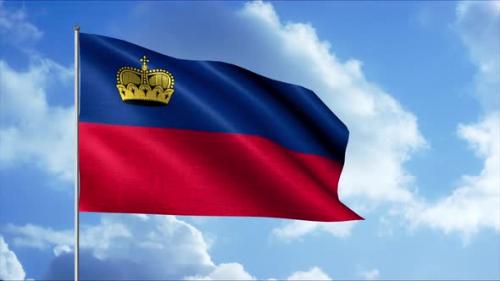 Videohive - The flag of the State of Liechtenstein rippling in the wind against a blue sky with flowing clouds - 37835019 - 37835019