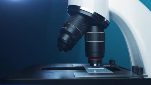 Videohive - close-up microscope. the lenses change the magnification ratio while observing viruses. - 37969980 - 37969980