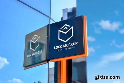 Company sign on a glass building logo mockup