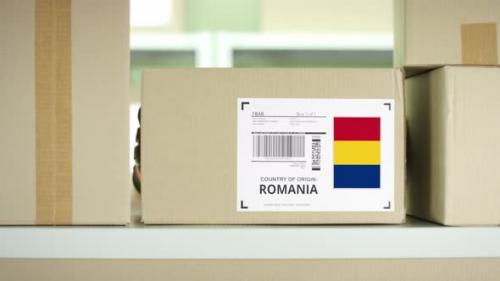 Videohive - Cardboard Parcel From Romania in a Postal Service Storage - 38398744 - 38398744