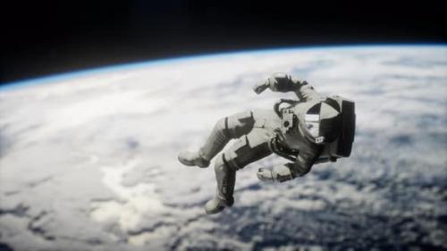 Videohive - Astronaut in Outer Space Elements of This Image Furnished By NASA - 38776472 - 38776472