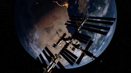 Videohive - International Space Station in Outer Space Over the Planet Earth Orbit - 38776536 - 38776536