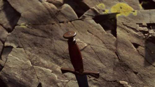 Videohive - Excalibur Sword in Rocky Stone at Sunset - 38781867 - 38781867