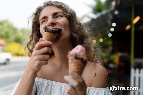 Young woman eating ice cream