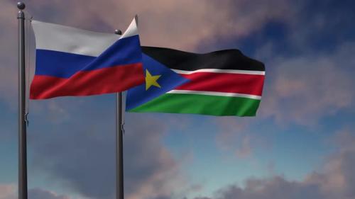 Videohive - South Sudan Flag Waving Along With The National Flag Of The Russia - 4K - 39652035 - 39652035