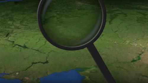 Videohive - Magnifying Glass Finds Kharkiv City on the Map - 39685025 - 39685025