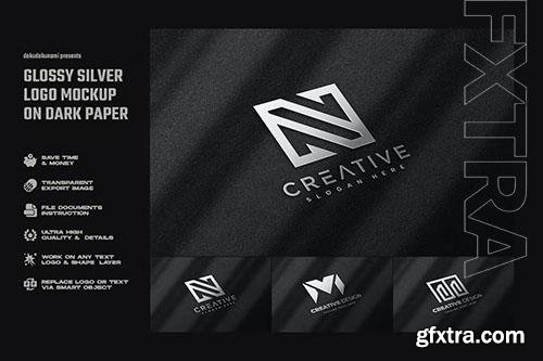 Glossy Silver Logo Mockup on Dark Paper PSD