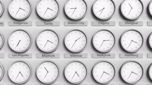Videohive - Round Clock Showing Vienna Time Within World Time Zones - 40534903 - 40534903