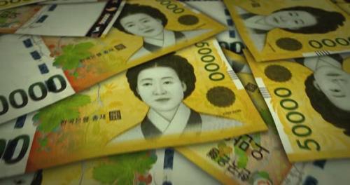 Videohive - South Korea Won 50000 banknote flying over money surface - 40952978 - 40952978