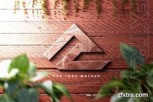 PSD 3d wood texture logo mockup or 3d realistic logo mockup on wood wall background