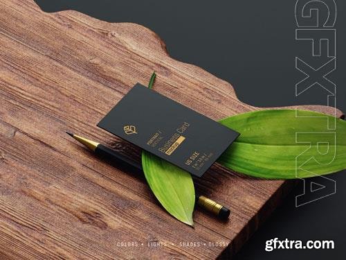 PSD vertical business card mockup with pencil and leaves