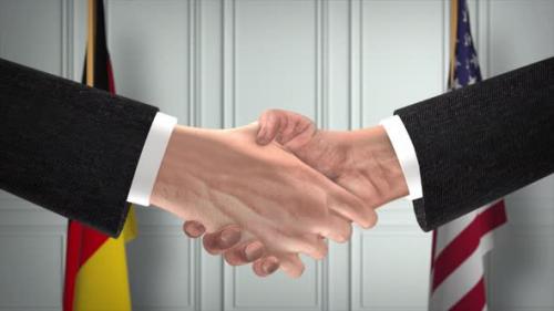 Videohive - Germany and USA Partnership Business Deal. National Government Flags. Official Diplomacy Handshake - 42344209 - 42344209