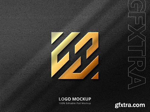 PSD golden emboss and deboss logo mockup with shadow overlay