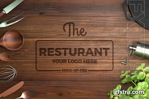 PSD logo mockup on wooden background