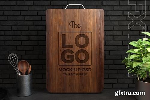 PSD logo mockup on wooden cutting board