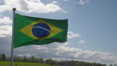 Videohive - Brazil Flag Waving in the Wind Blue Sky Background - 40475363 - 40475363