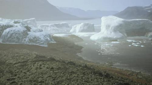 Videohive - Gigantic Ice Block Structures on the Black Sand By the Sea Shore - 42558489 - 42558489