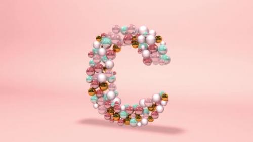 Videohive - Letter C made of beads, glass balls, pastel pearls, crystal jewels and gold. - 42660205 - 42660205