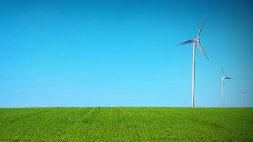 Videohive - 3d Animation of Windmills on a sown field. Concept of eolic clean and renewable energy from the wind - 43001867 - 43001867