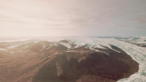 Videohive - Large Snow Patch Left Over on the Volcanic Rock Field of a Mountain in Summer - 43072569 - 43072569