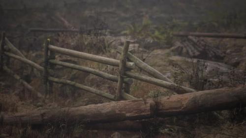 Videohive - An Old Wood Fence with a Country Field Behind It - 43210668 - 43210668