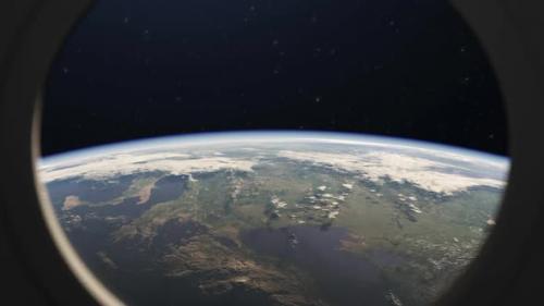 Videohive - Planet Earth view from the porthole window of the space station. - 43212109 - 43212109