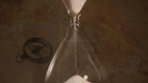 Videohive - Animation of hourglass over vintage compass and world map - 43356080 - 43356080