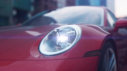 Videohive - red car close-up shines headlights in urban environment camera movement with Dolly Zoom effect - 43405412 - 43405412