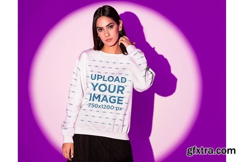 Sweatshirt Mockup Featuring a Serious Woman Posing