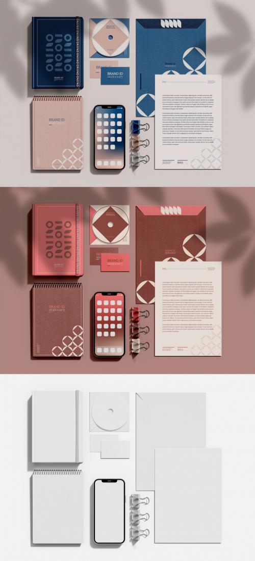 Top View of Stationery Set with Smartphone Mockup 584378194