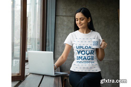 Gildan Tee Mockup of a Woman Using Her Laptop YW3USYT