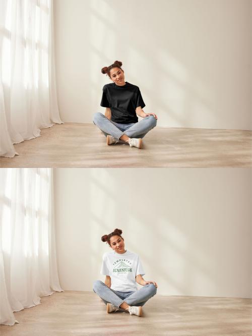 Mockup of woman wearing customizable color t-shirt with design, sitting on floor 634459289