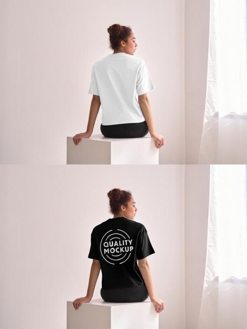 Mockup of woman wearing customizable color t-shirt, rear view 637251278