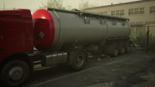 Videohive - Large White Cistern Trucks in a Factory - 47640124 - 47640124