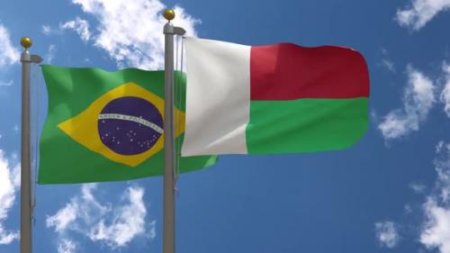 Videohive - Brazil Flag Vs Madagascar Flag On Flagpole - 47645825 - 47645825