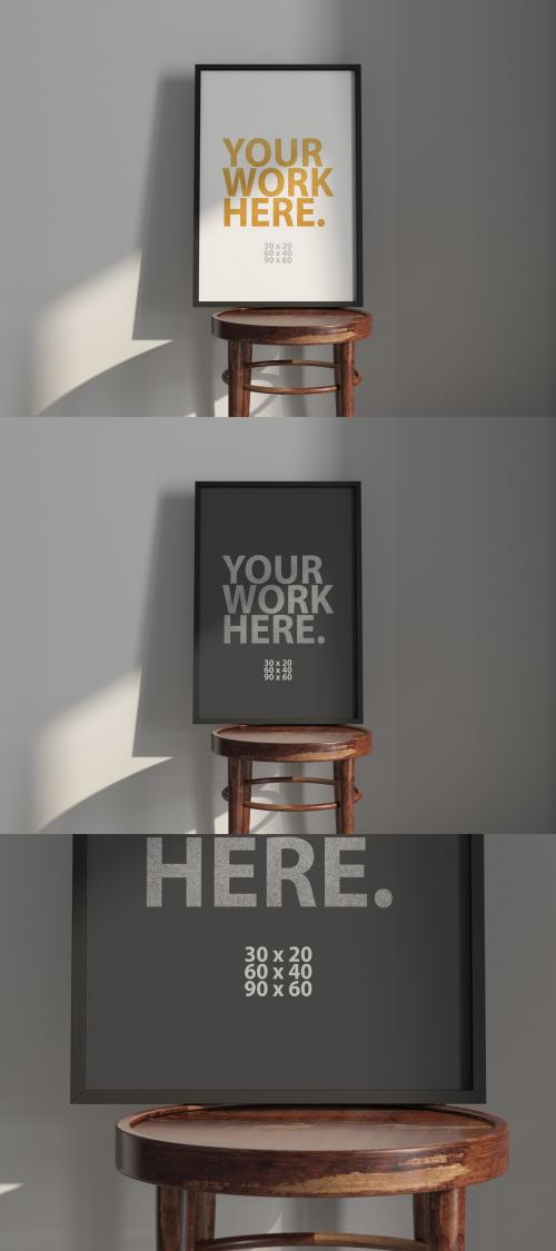 Vertical black poster Frame Mockup on wooden chair 635945351