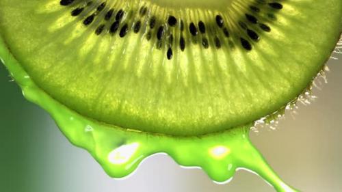 Videohive - Super Slow Motion Macro Shot of Flowing Juice From Kiwi Slice at 500Fps - 47749820 - 47749820