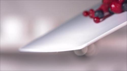 Videohive - Berries Rolling Down a Cutting Board in Slow Motion - 47752954 - 47752954