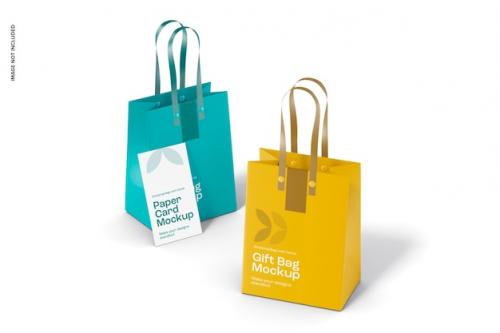 Premium PSD | Gift bags with paper card mockup, perspective Premium PSD