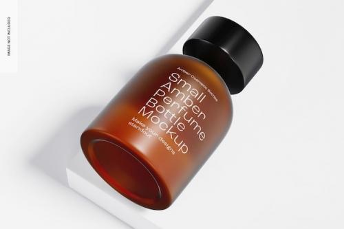 Premium PSD | Small amber perfume bottle mockup, perspective Premium PSD