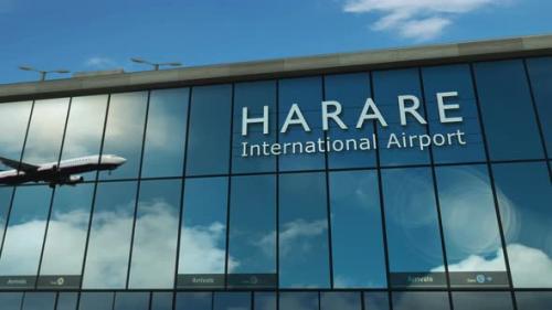 Videohive - Airplane landing at Harare Zimbabwe airport mirrored in terminal - 47905725 - 47905725