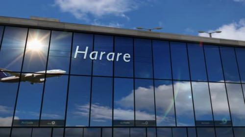 Videohive - Airplane landing at Harare Zimbabwe airport mirrored in terminal - 47905732 - 47905732