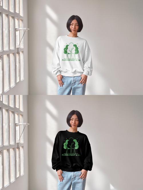 Mockup of Asian woman wearing sweatshirt with customizable color by window 640128044