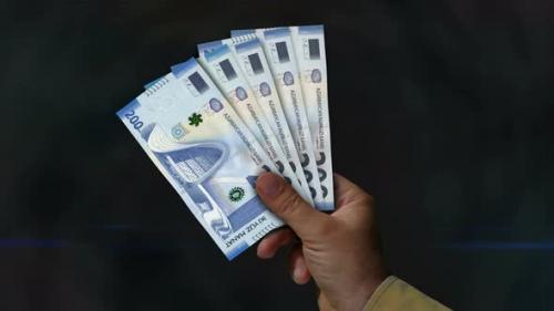 Videohive - Azerbaijan Manat money fan of banknotes in hand - 47968657 - 47968657