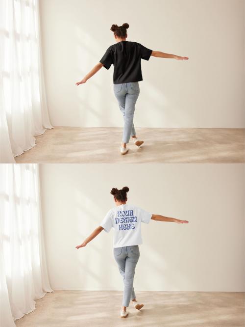 Mockup of woman wearing t-shirt with customizable color standing with arms out, rear view 640119848