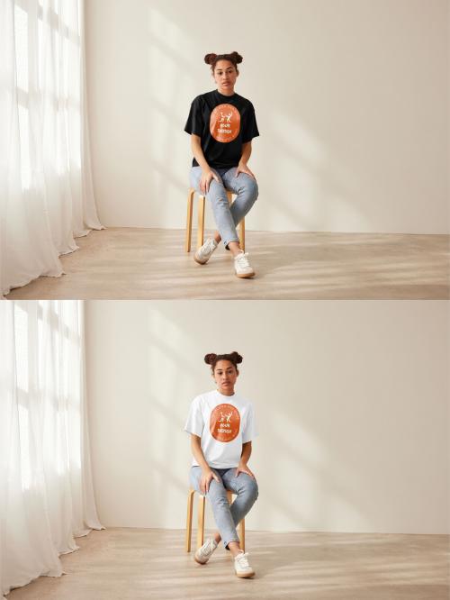 Mockup of woman wearing t-shirt with customizable color, sitting on chair 640119779