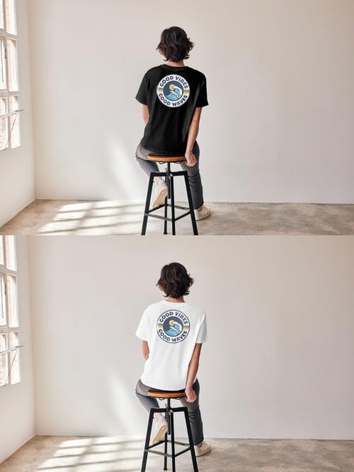 Mockup of woman wearing t-shirt with customizable color sitting on stool, rear view 649149333