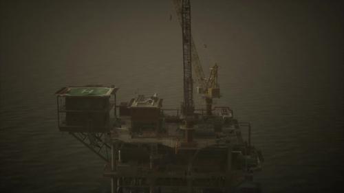 Videohive - An Oil Rig Standing Tall in the Vast Expanse of the Ocean - 48093854 - 48093854
