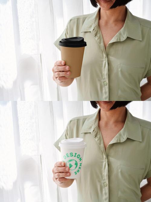 Mockup of woman holding customizable takeaway drinks cup with lid 646710344